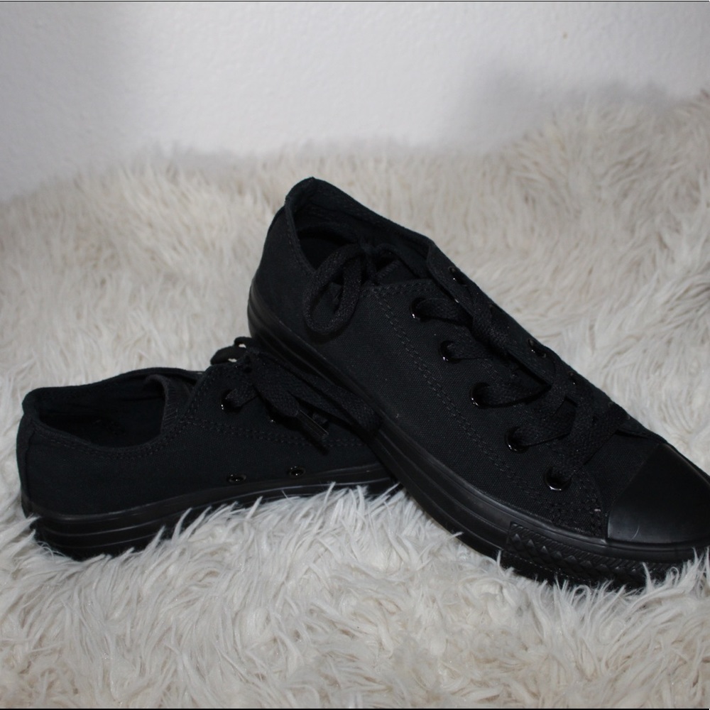 All black converse.